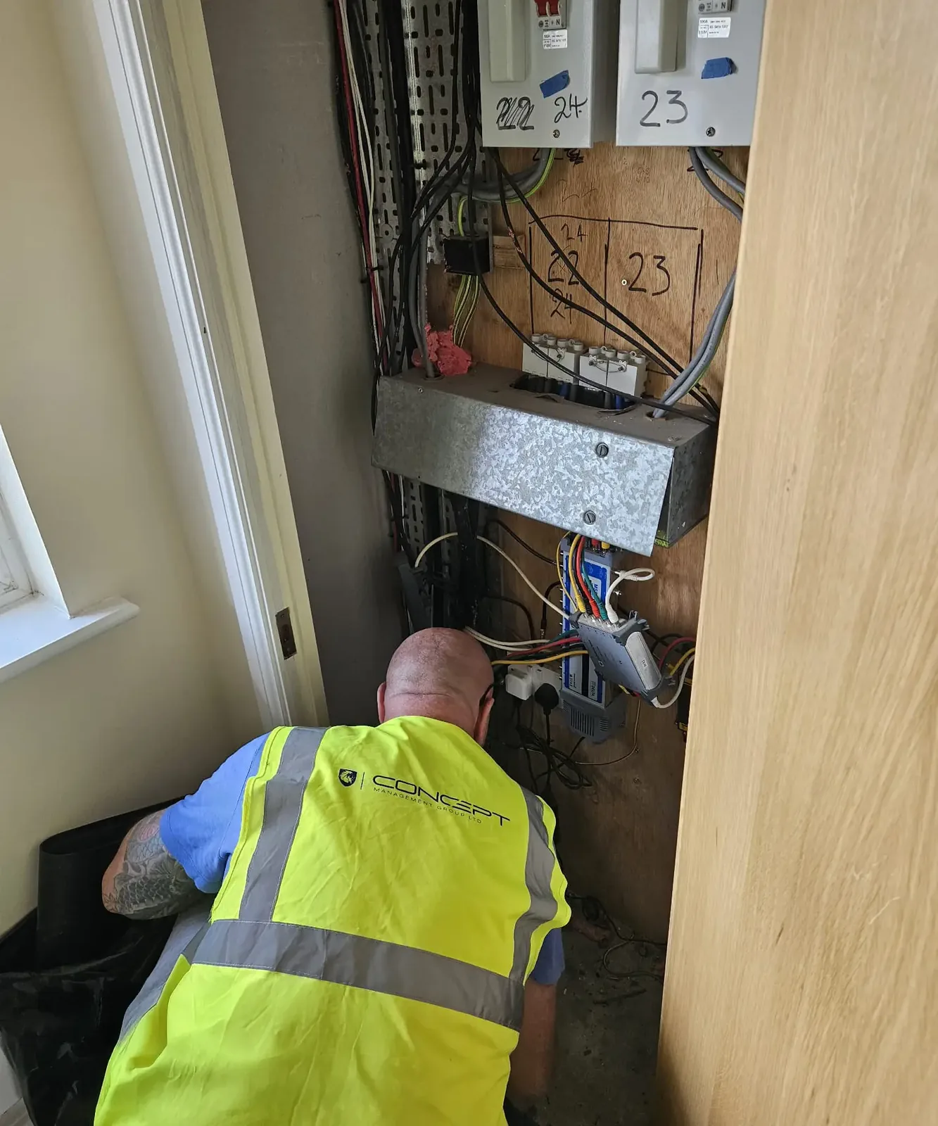 Operative inspecting an electrical installation