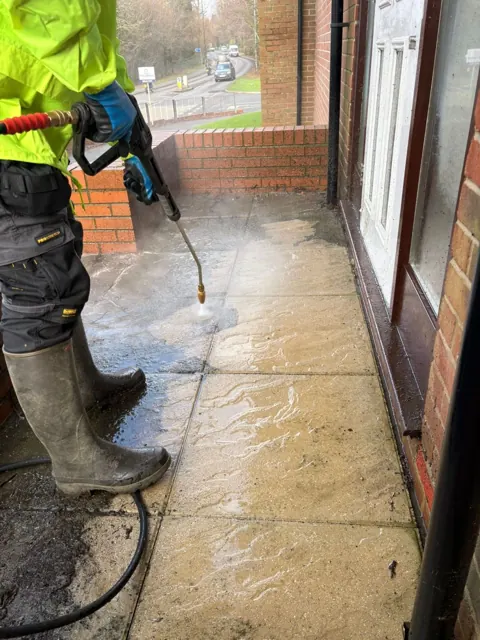 Cleaning entrance paving