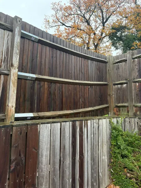 Timber fence reinforcement