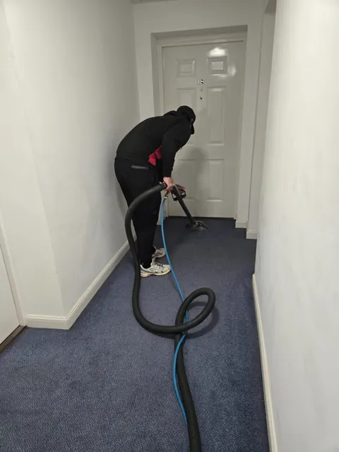 Stair carpet cleaning in progress