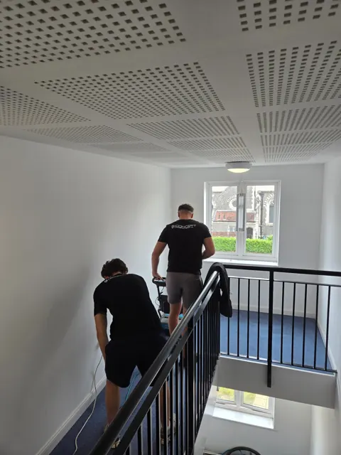 The team preparing a communal landing